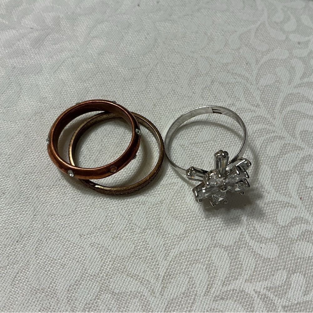 Three Rings in Mixed Metals